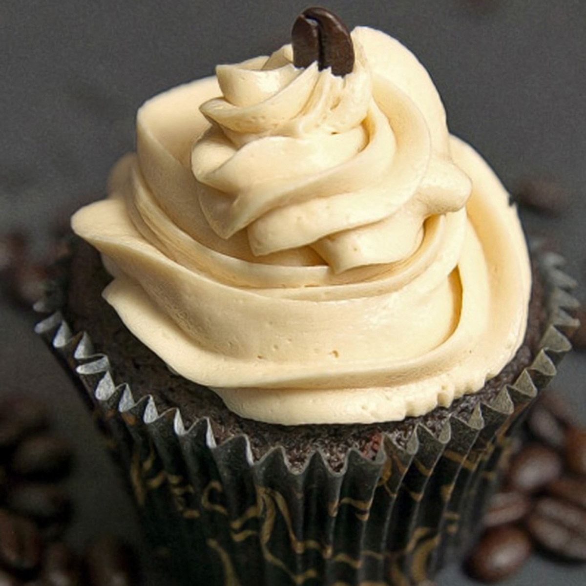 Chocolate cupcake with frosting on top.