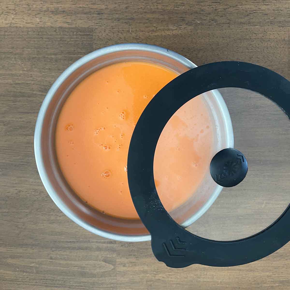 Putting the lid on the bowl.
