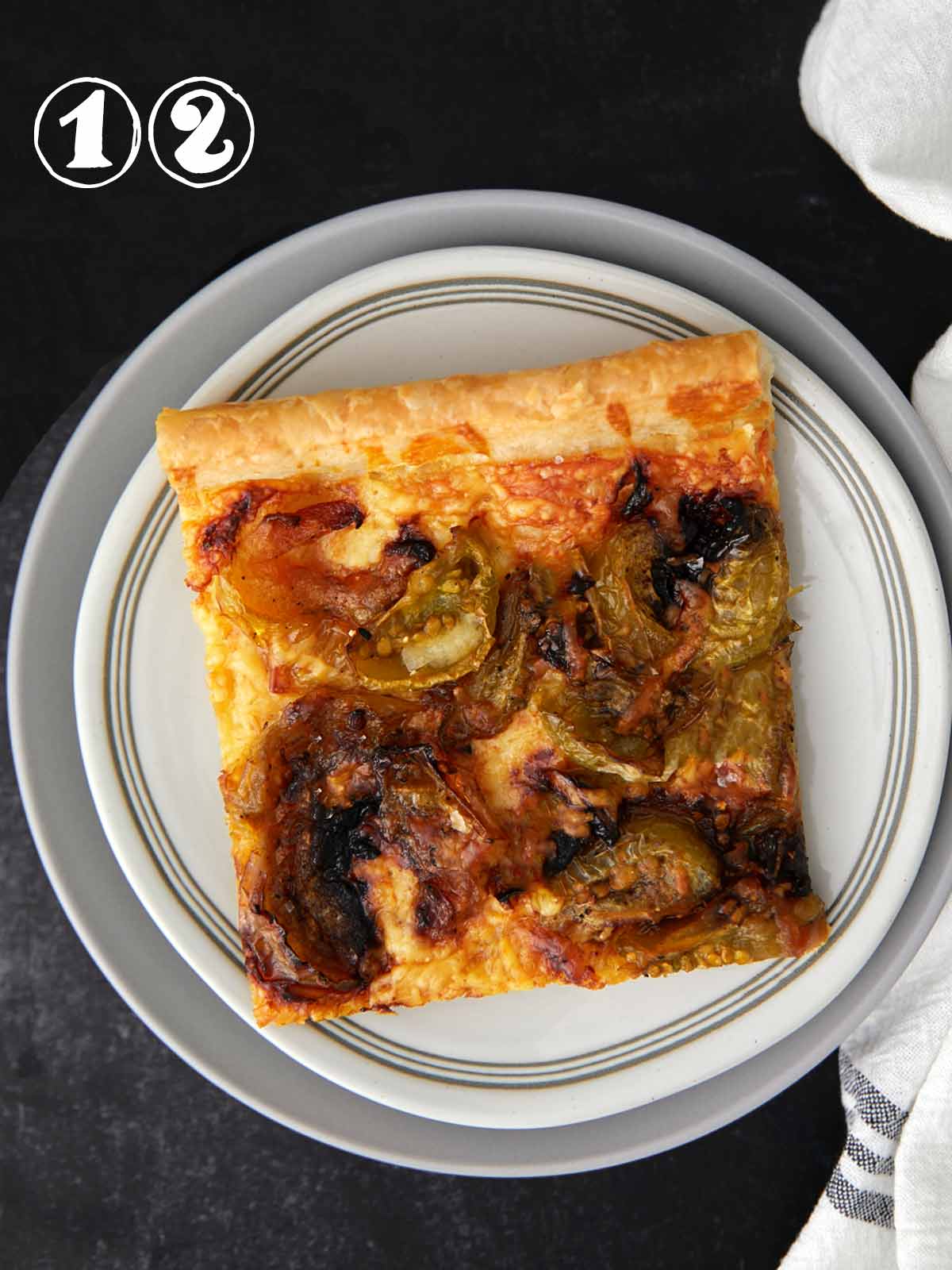 A slice of baked green tomato tart.