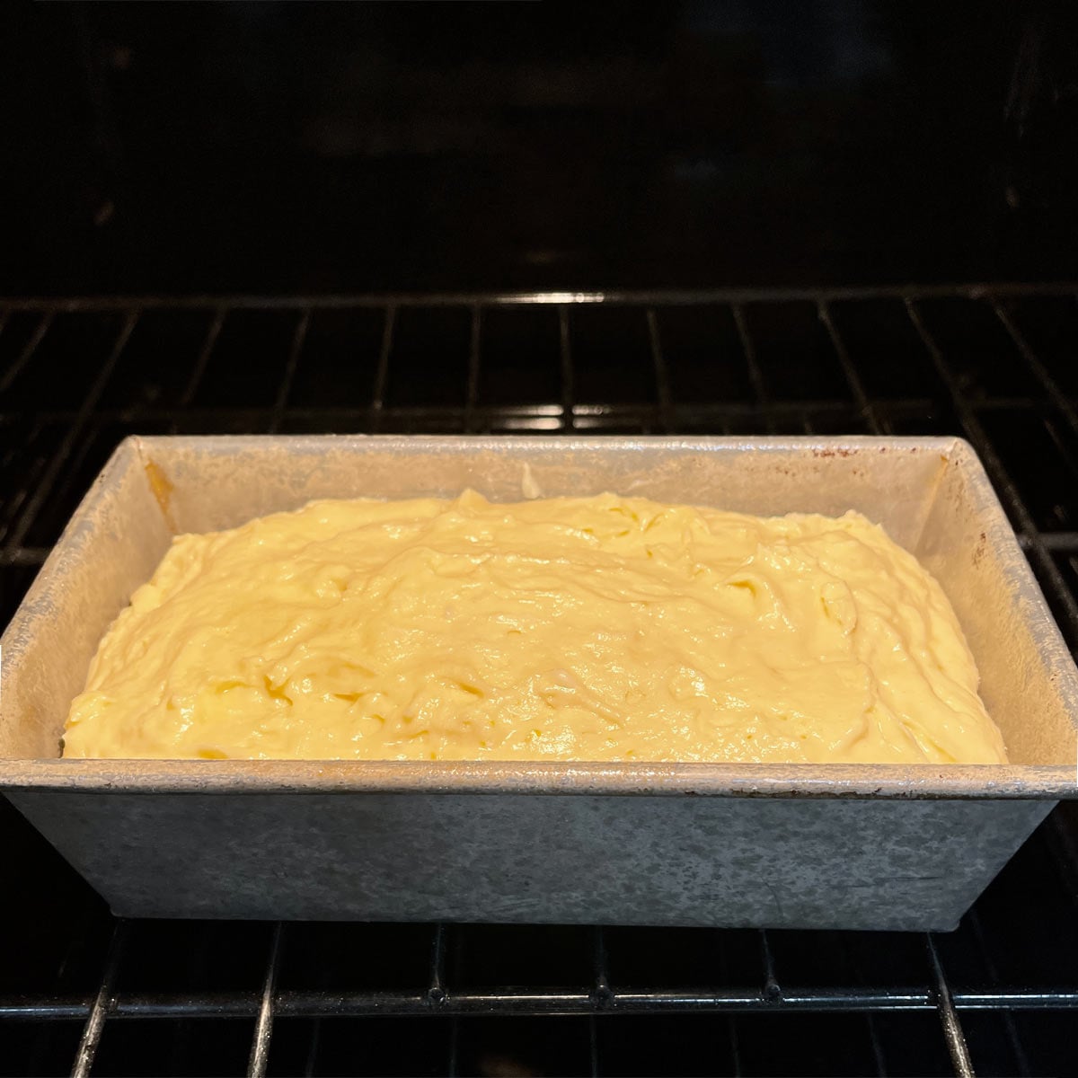 Pound cake batter placed into the oven.