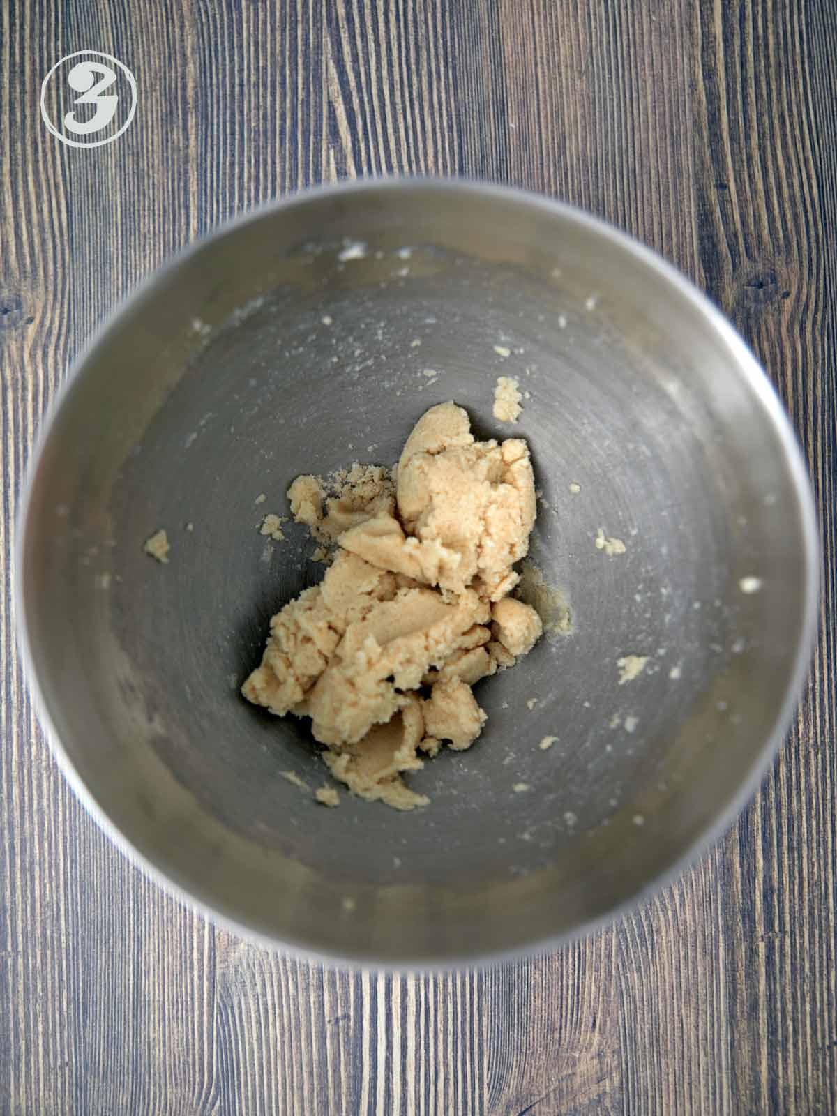Mixing bowl with butter and sugar.