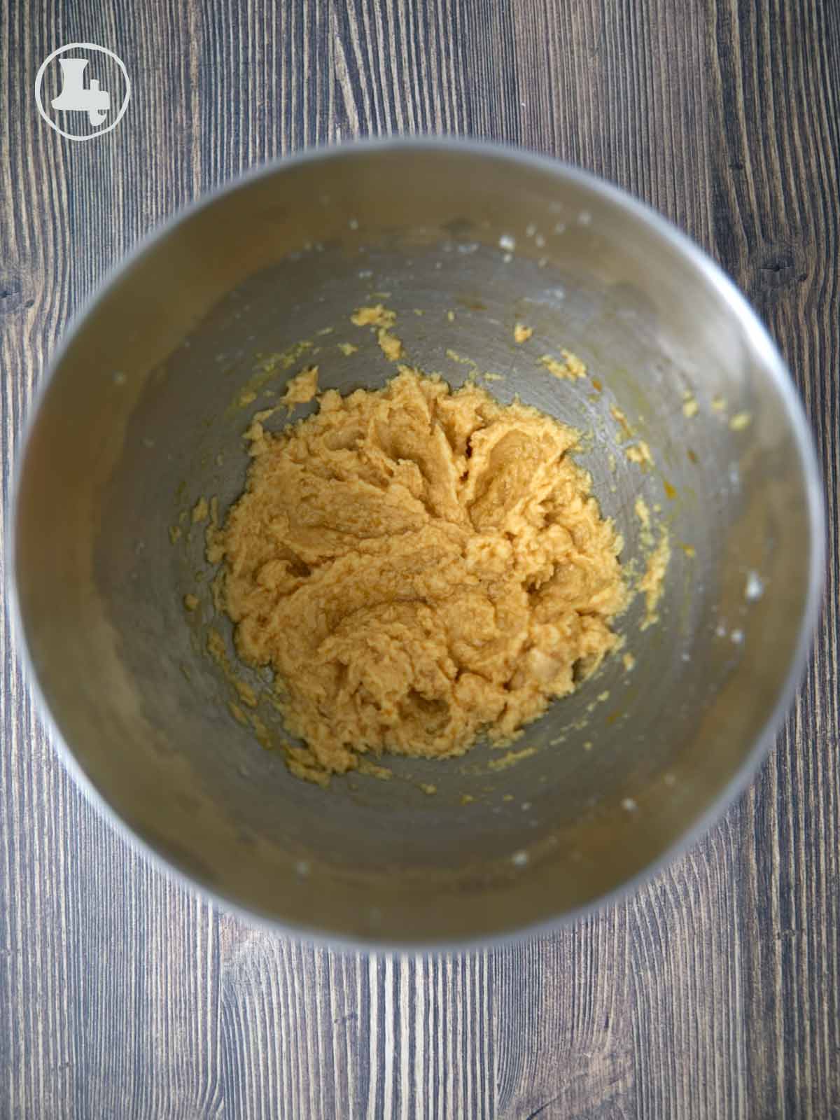 MIxing bowl with eggs added to creamed butter and sugar.