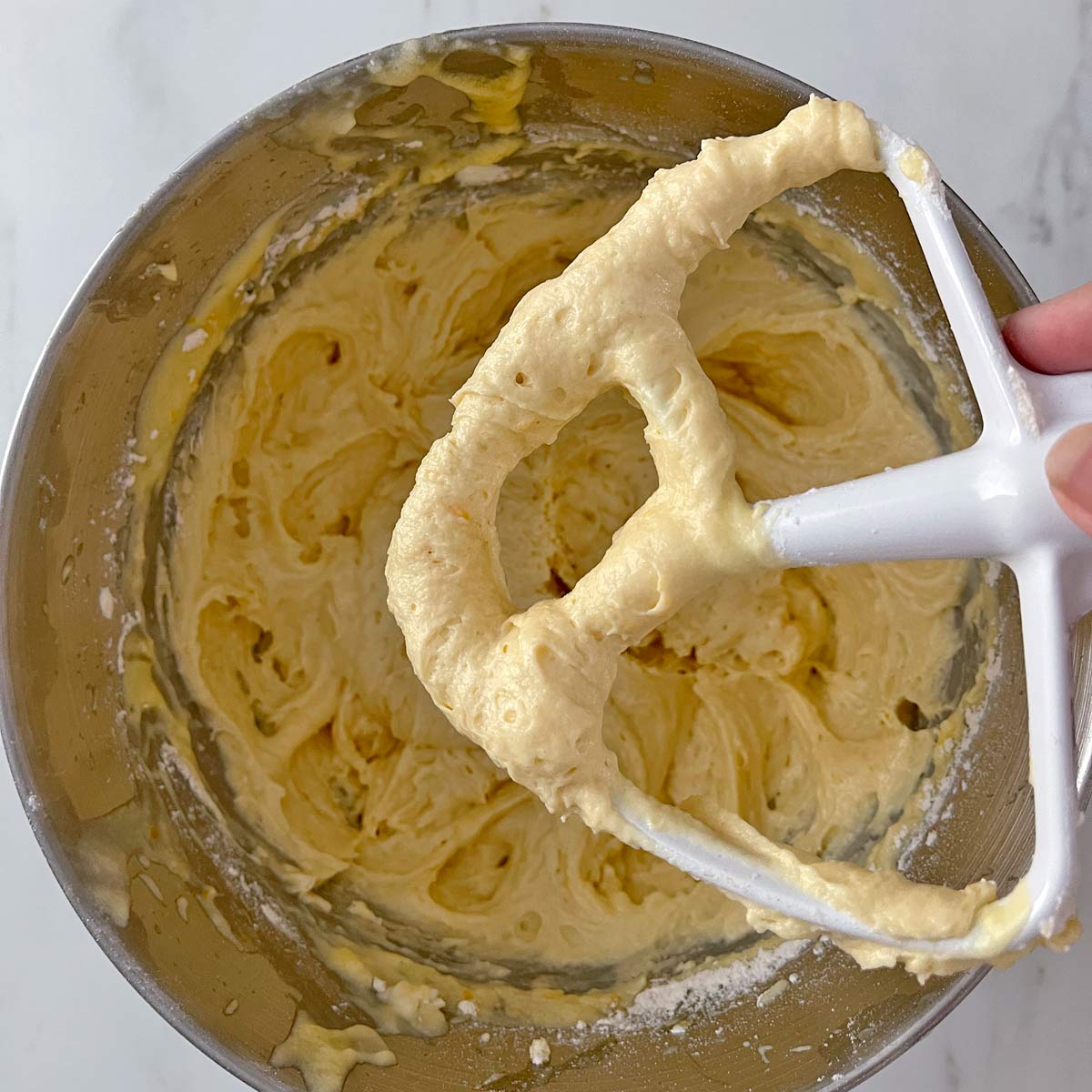 Mixing bowl with paddles showing beaten batter, ready to use.
