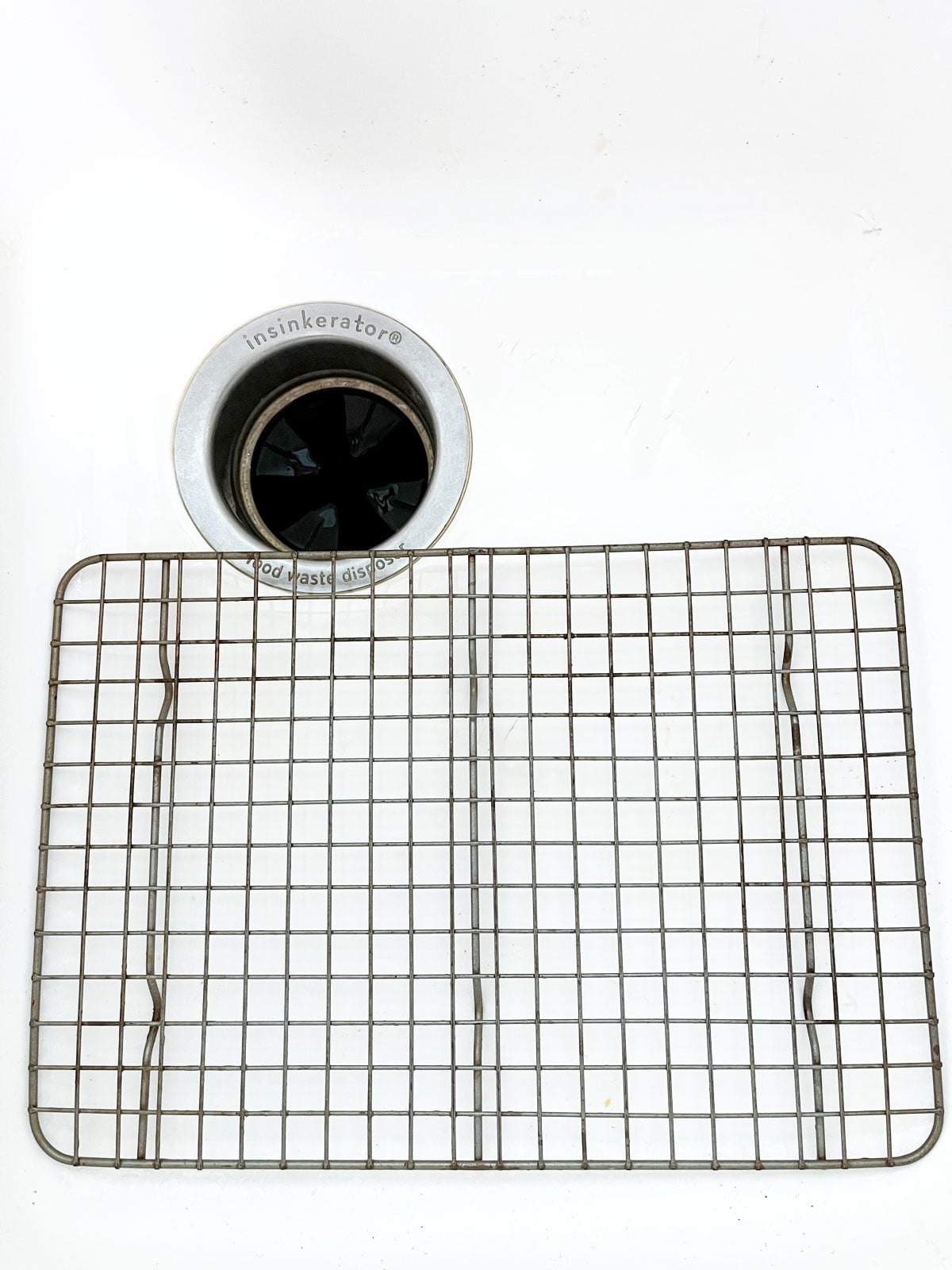 Wire rack in sink.