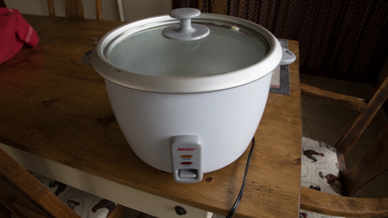 Rice steamer with manapua inside.