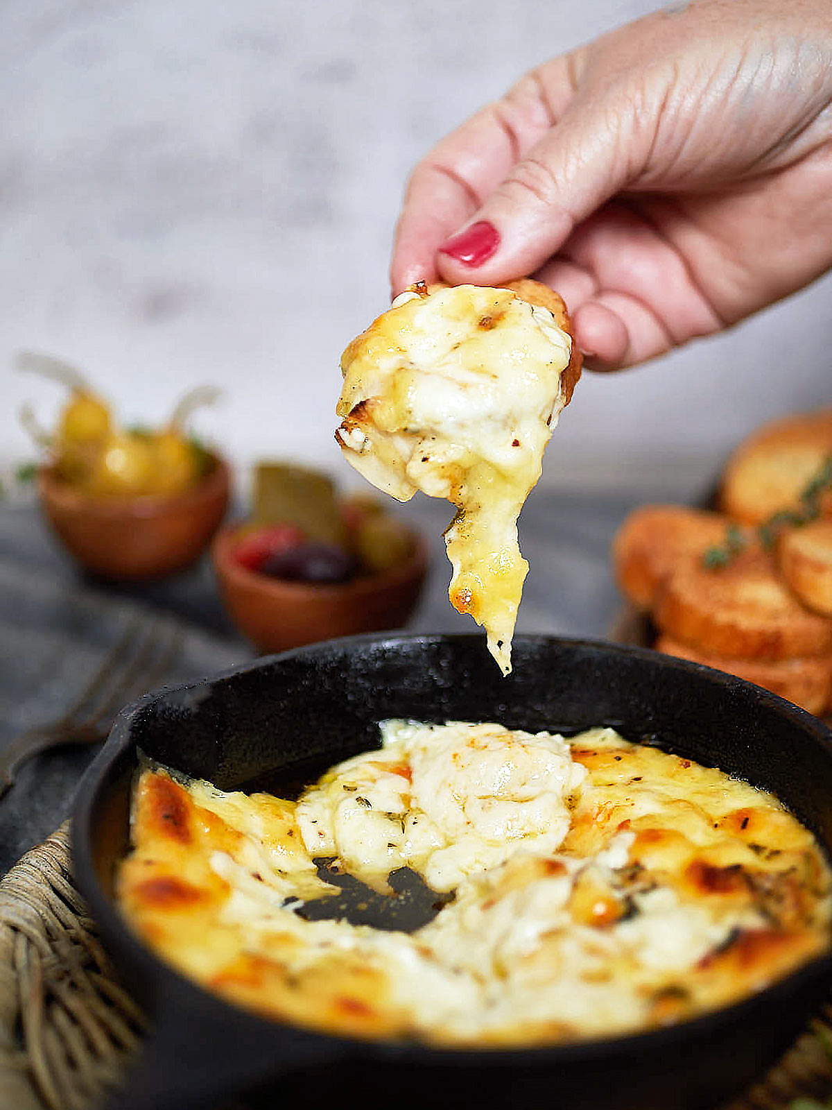Baked Fontina with gooey cheese pull