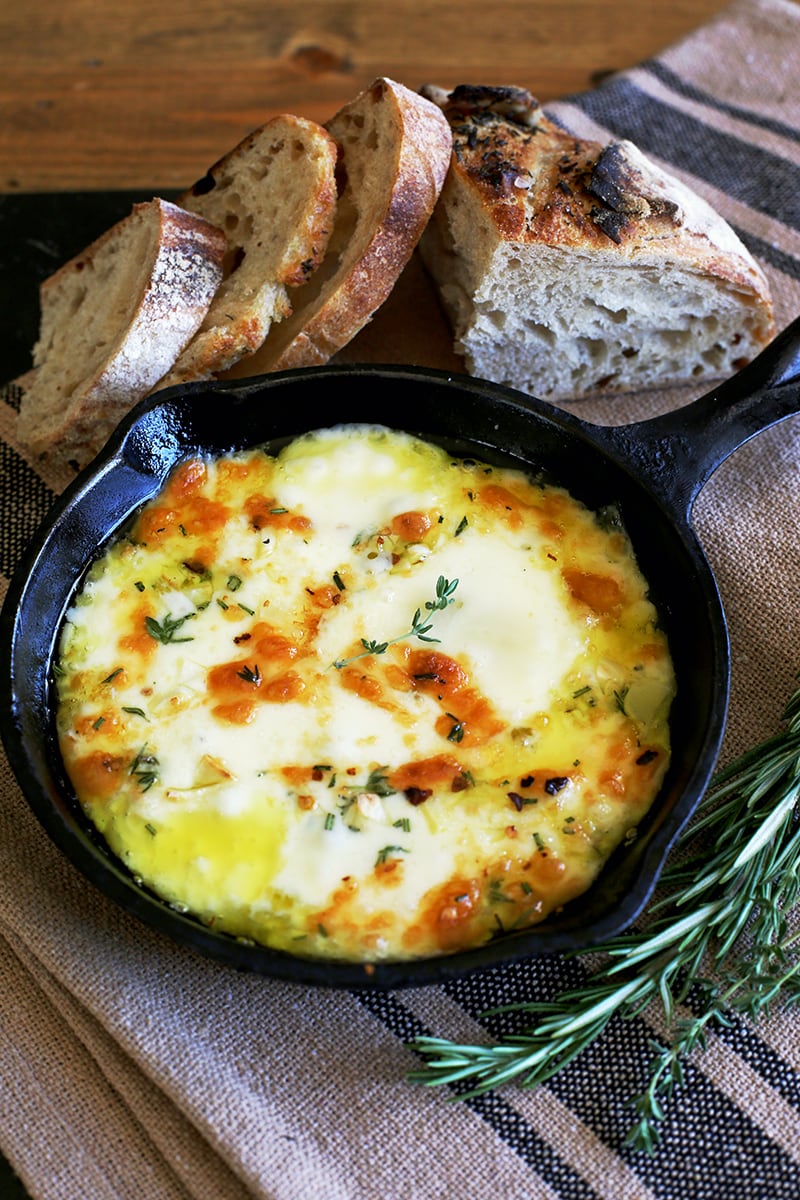 Baked Fontina  in cast iron skillet.