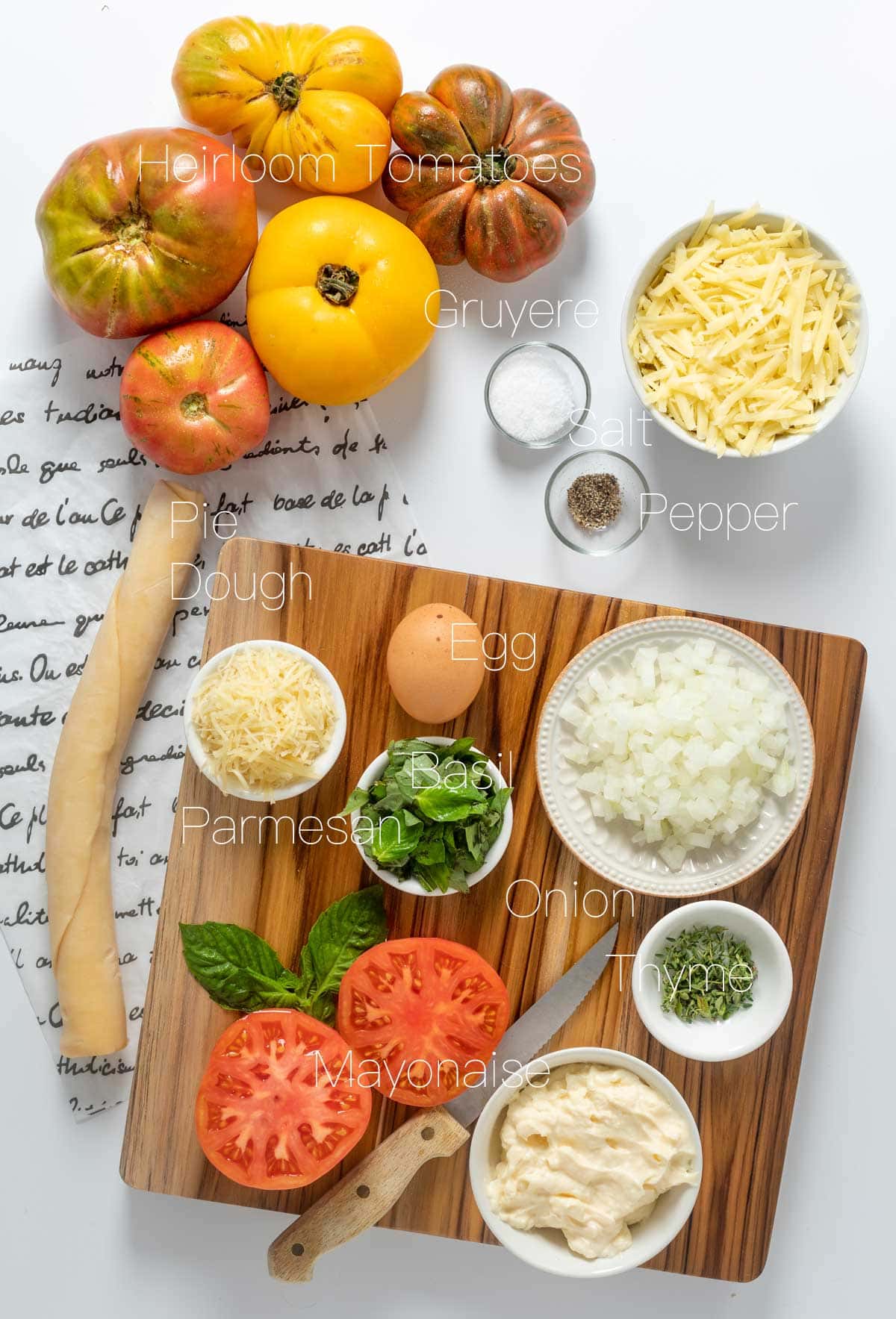 All of the ingredients to make a tomato tart.