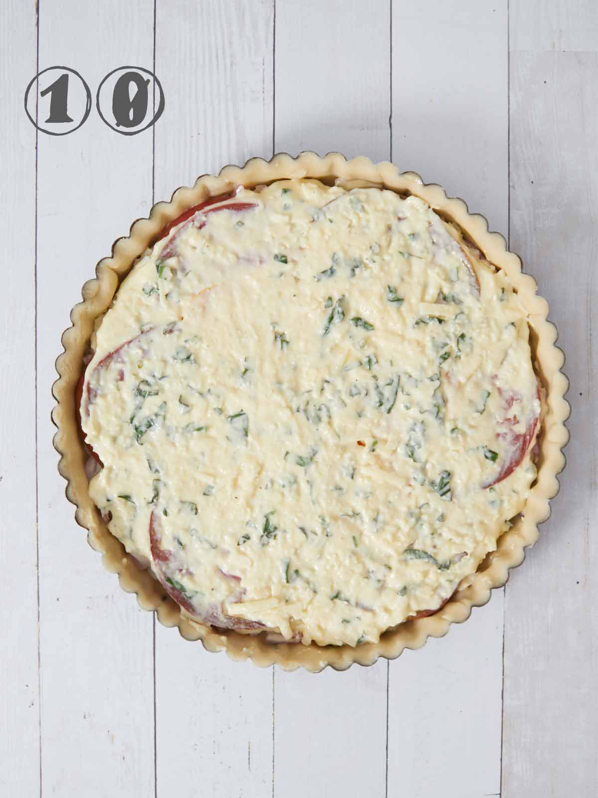 Another layer of the cheese mixture over the tomatoes.