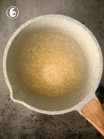 Grits cooking in a pot.