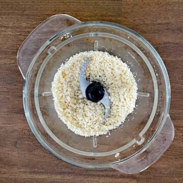 Macadamia nuts ground in the food processor.