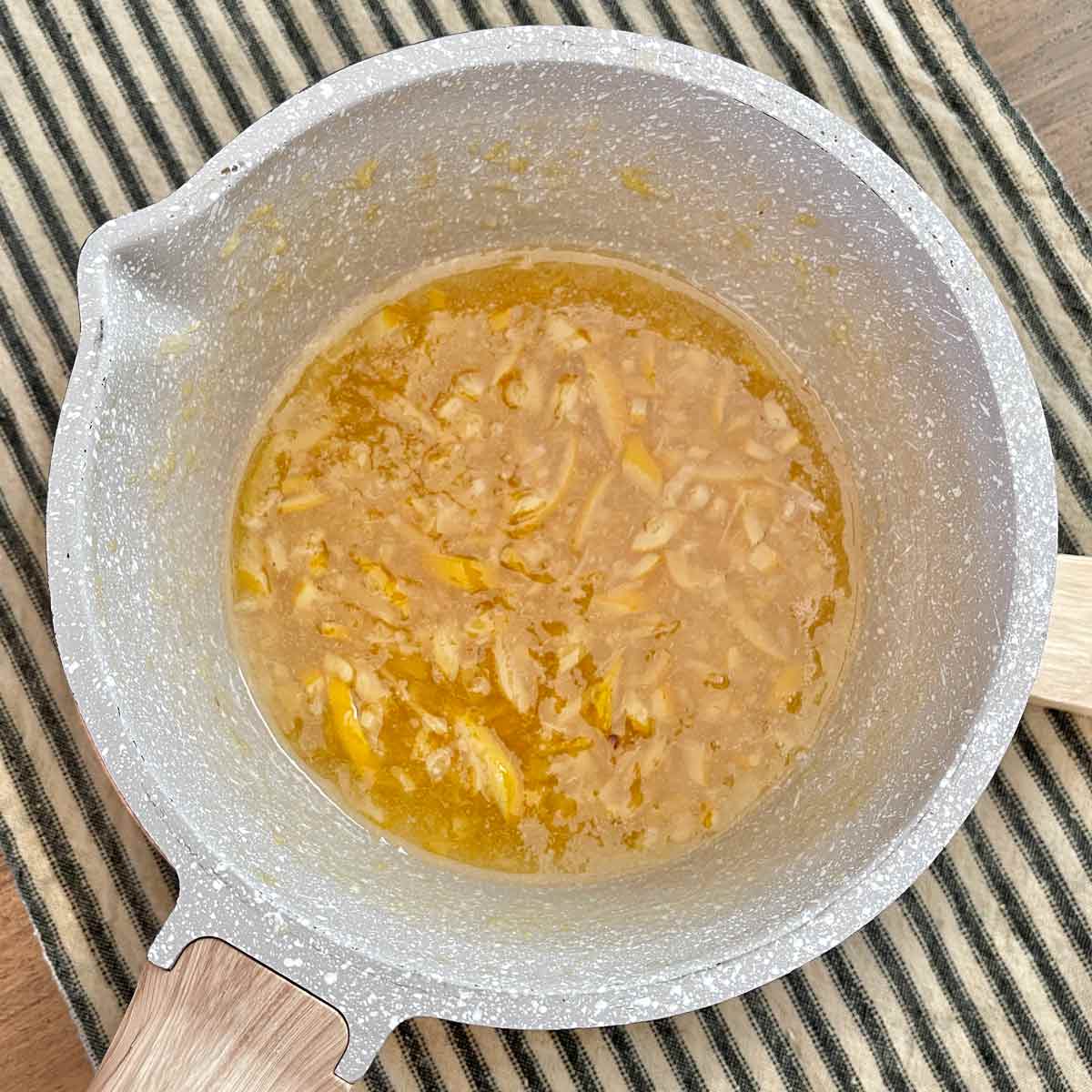 Pot is removed from heat and the marmalade is thick,