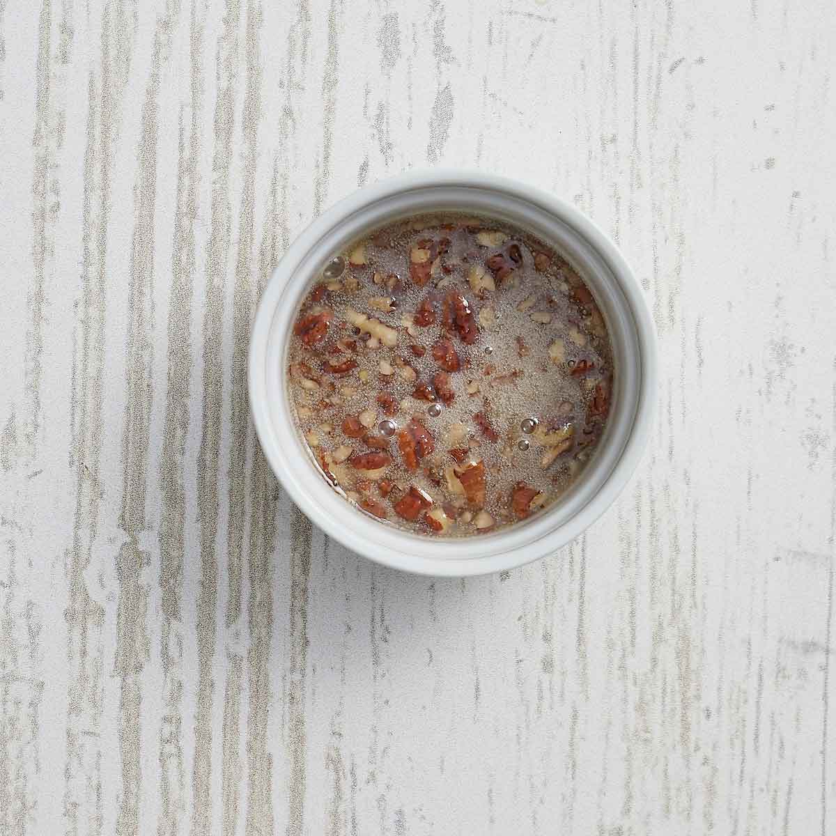 The glaze has been poured into a small bowl for the refrigerator.