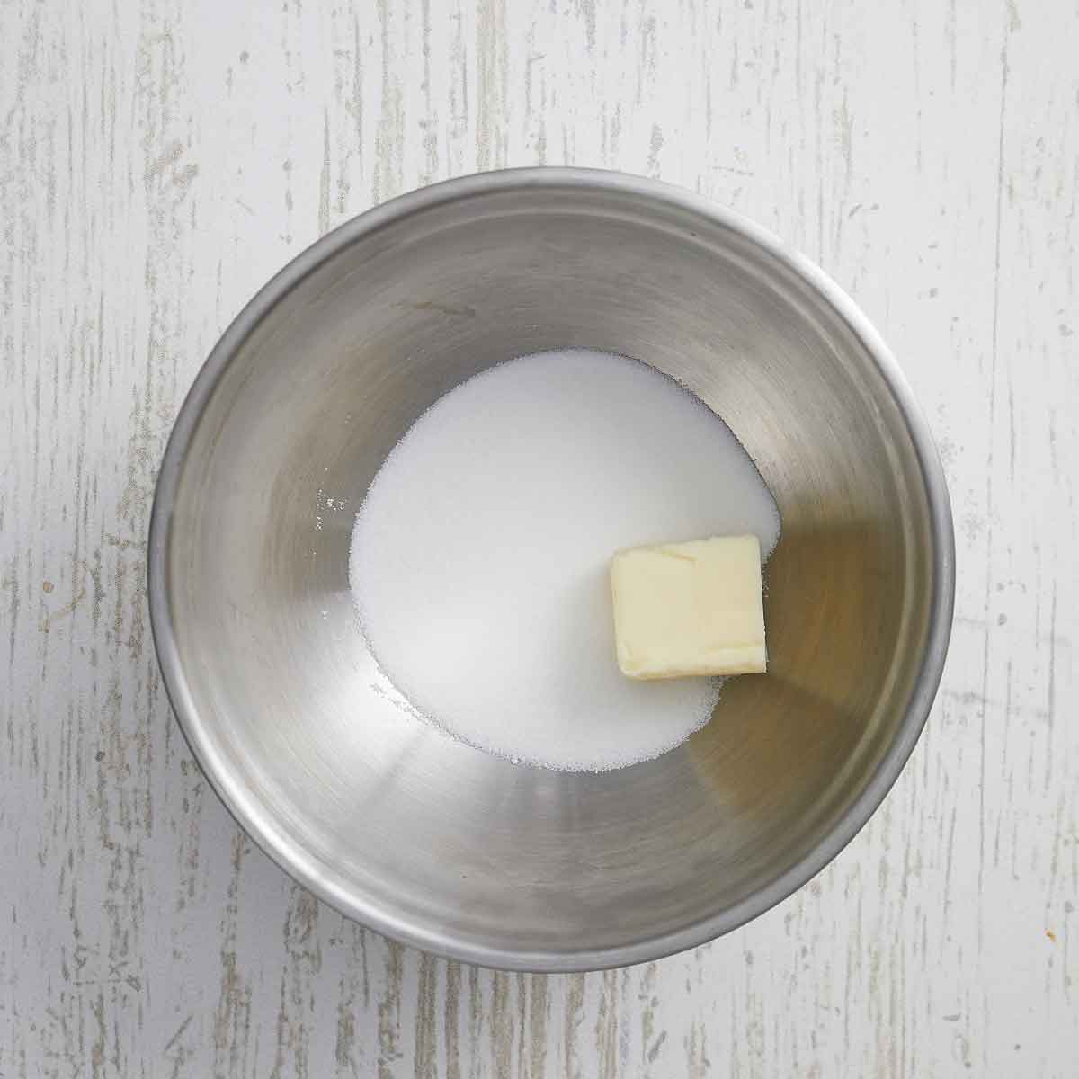Bowl with sugar and butter.