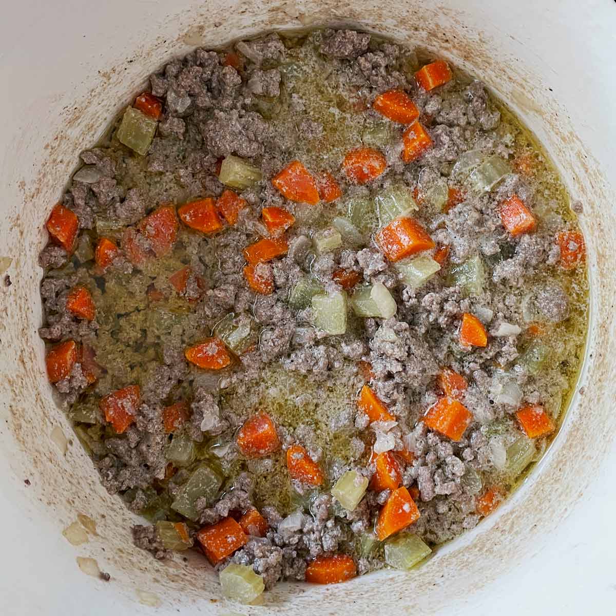 Image of the pot with all the wine cooked out.