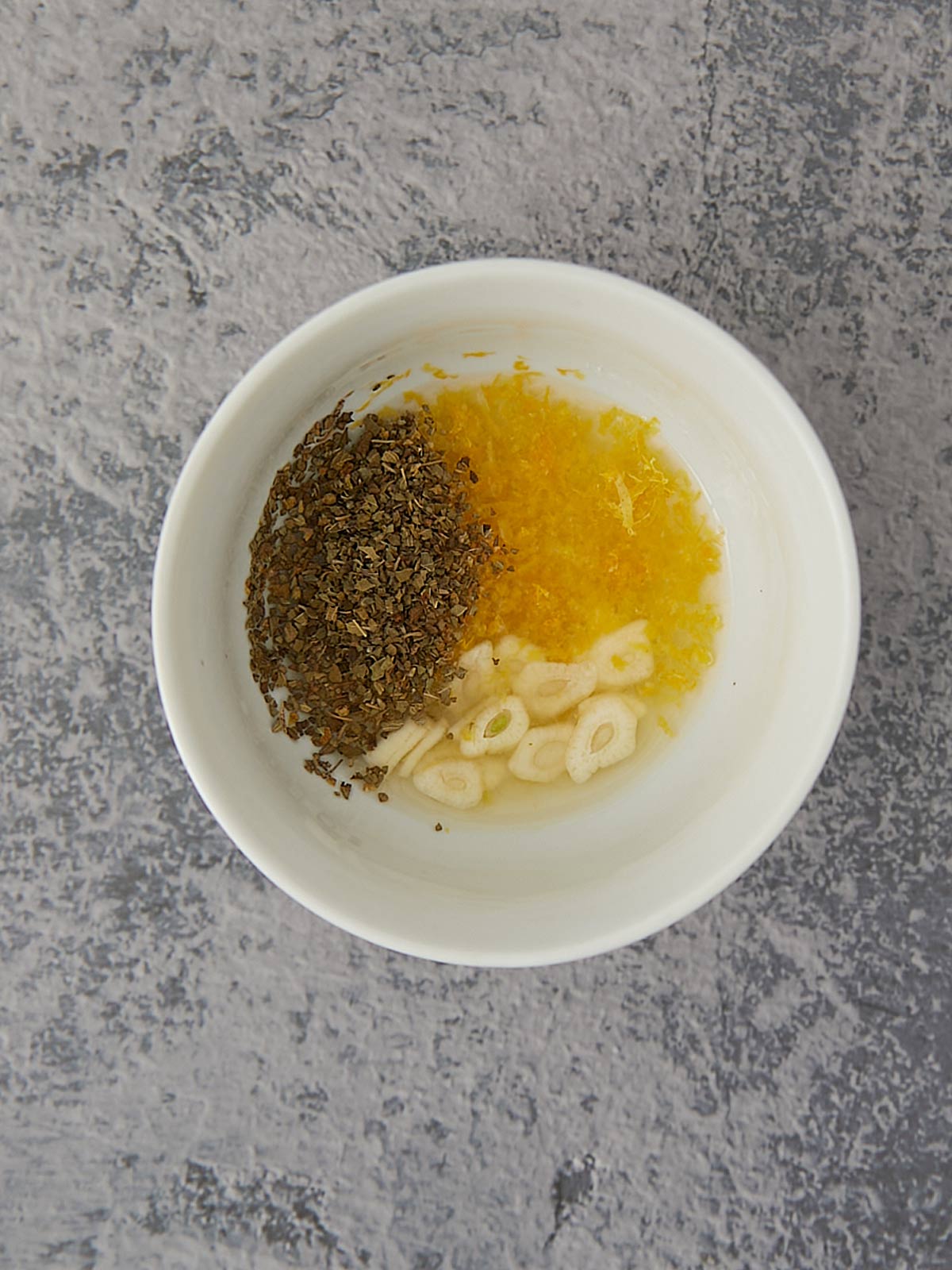 Ingredients fpr the marinade in a small bowl.