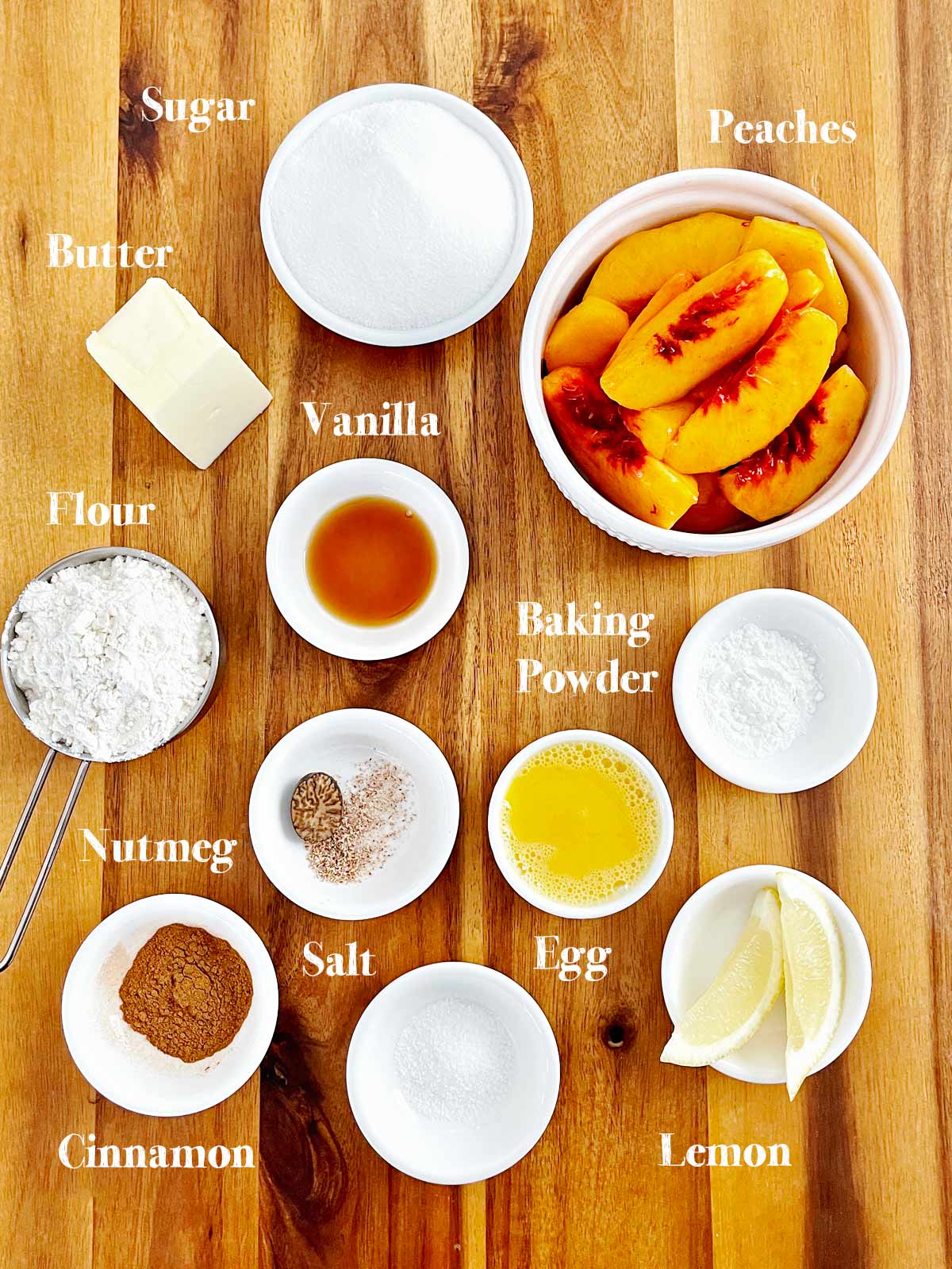 Ingredients for Peach Cobbler on cutting board.