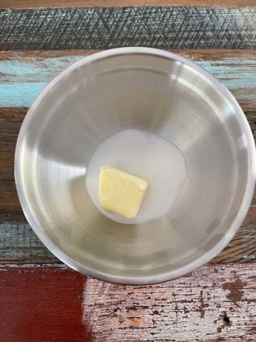Mixing bowl with sugar and butter.