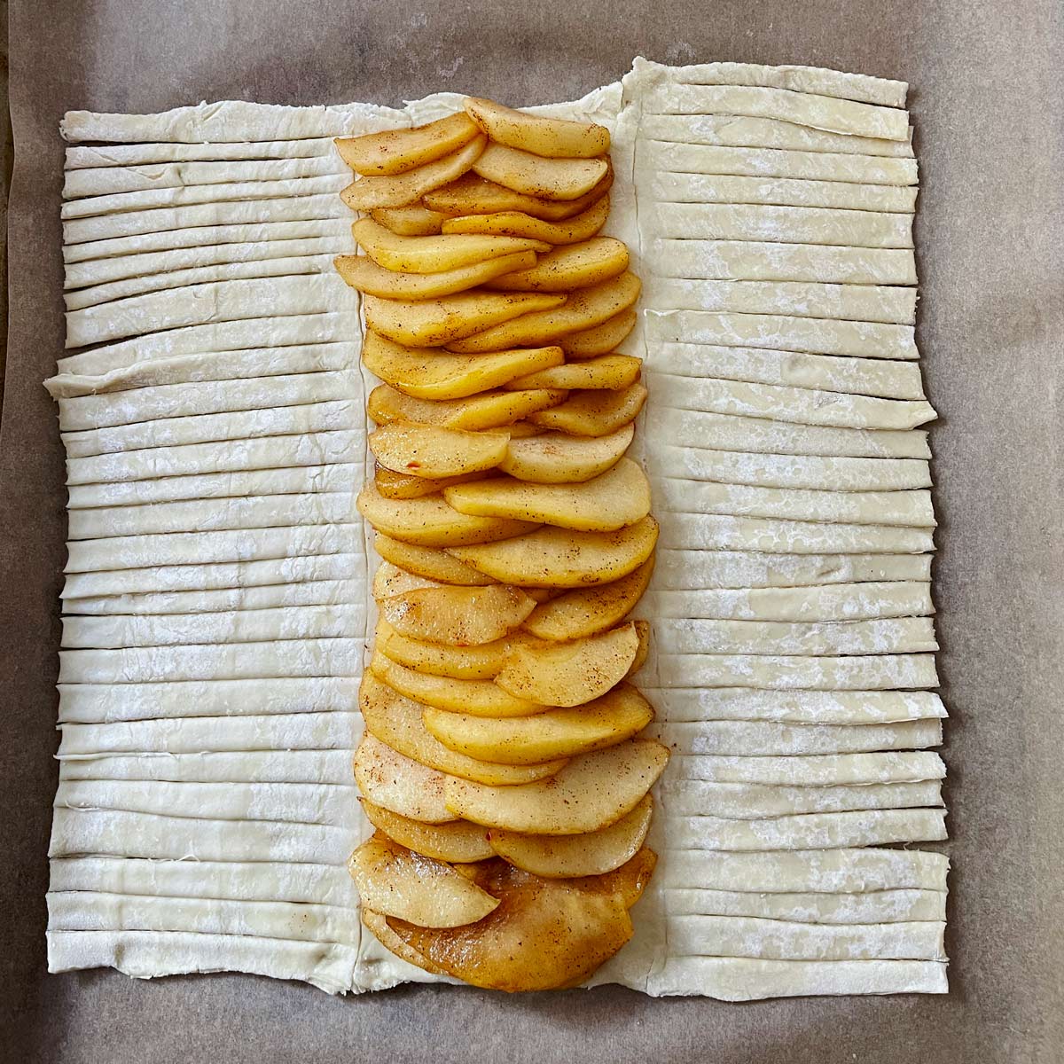 Cut pastry with apples down the center.