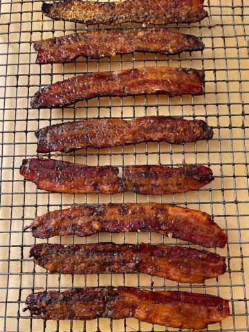 Bacon is fully cooked and cooling on wire rack.