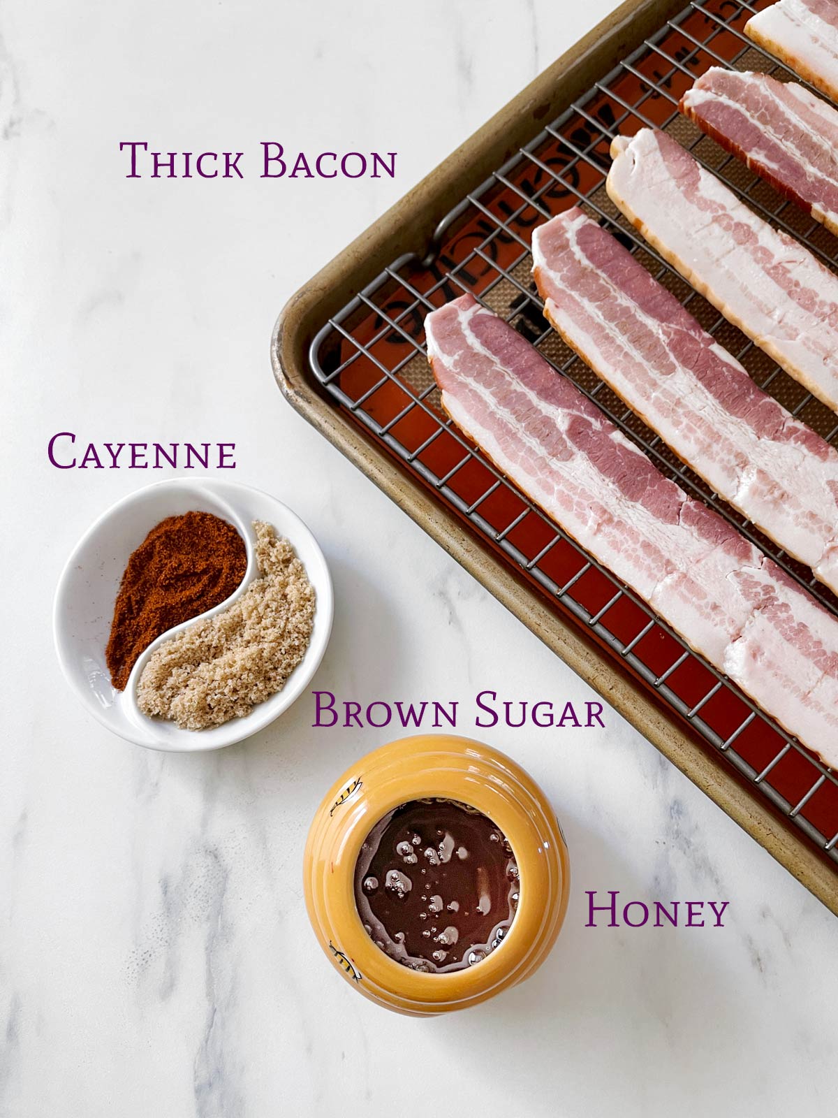 Ingredients for Million Dollar Candied Bacon Recipe on marble surface.