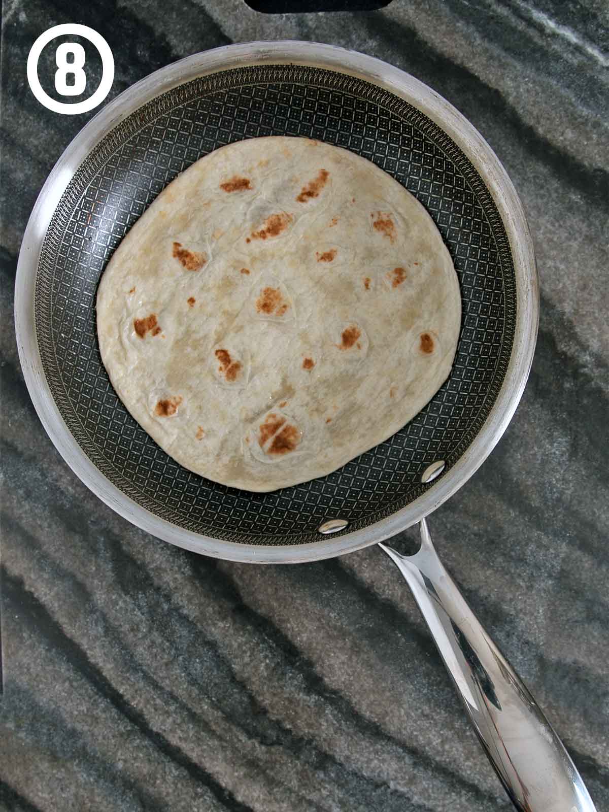 A tortilla in a pan.