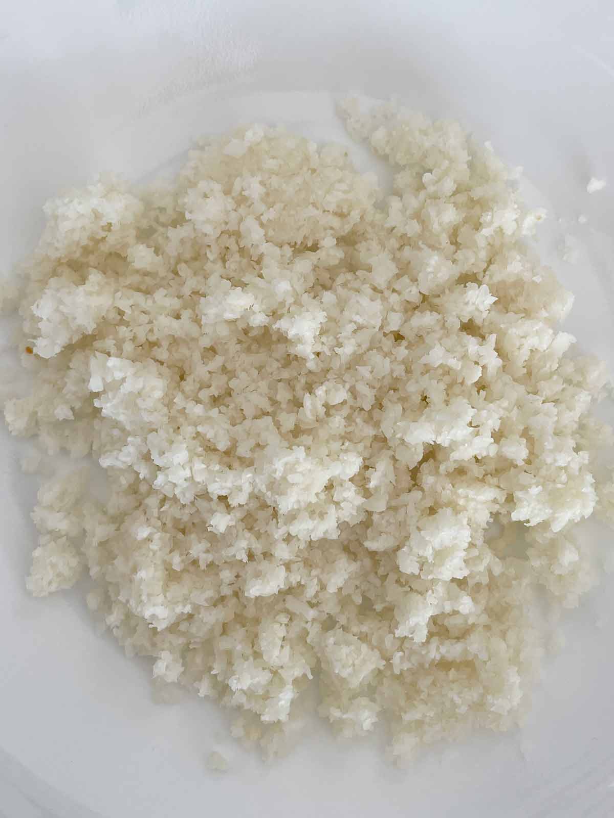 Rice after pulsed in food processor.