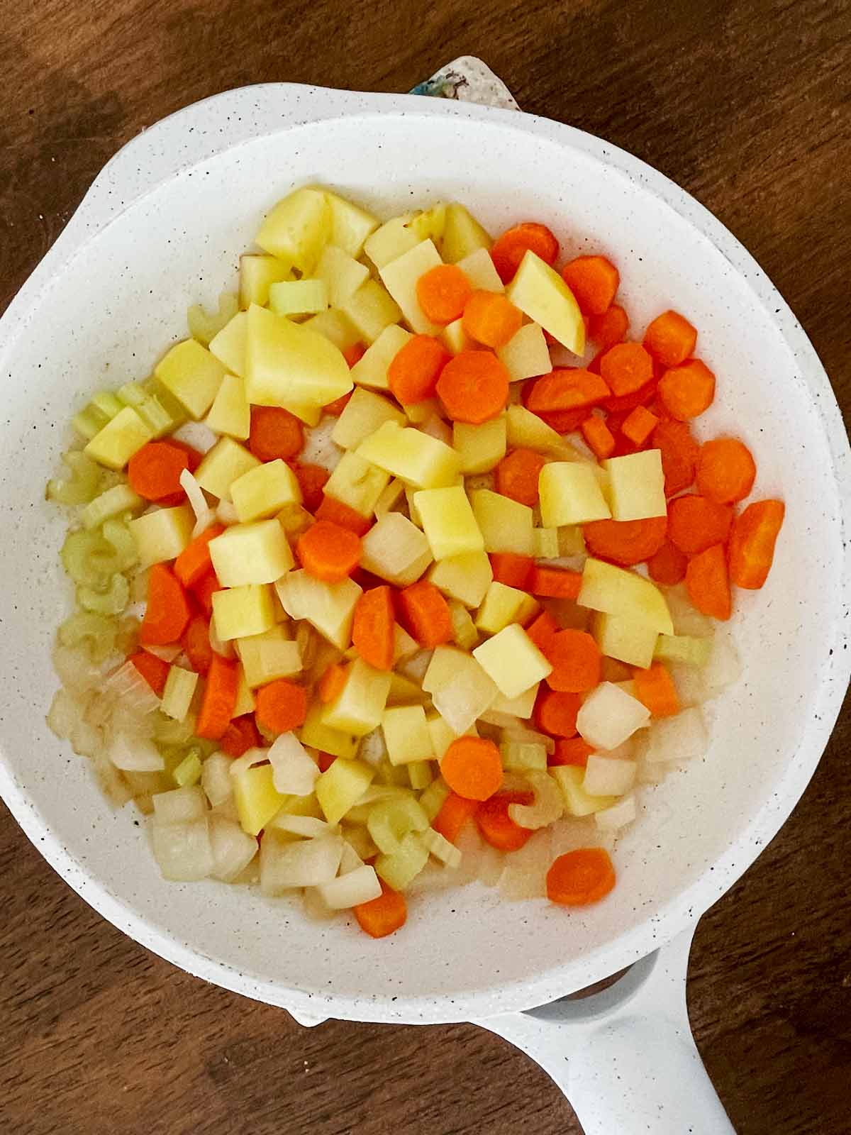 Cooked vegetables in the skillet.