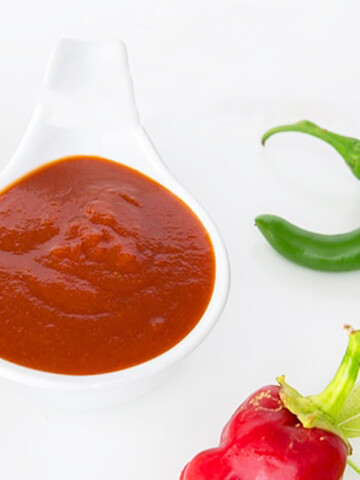 BBQ sauce with green and red chilies.