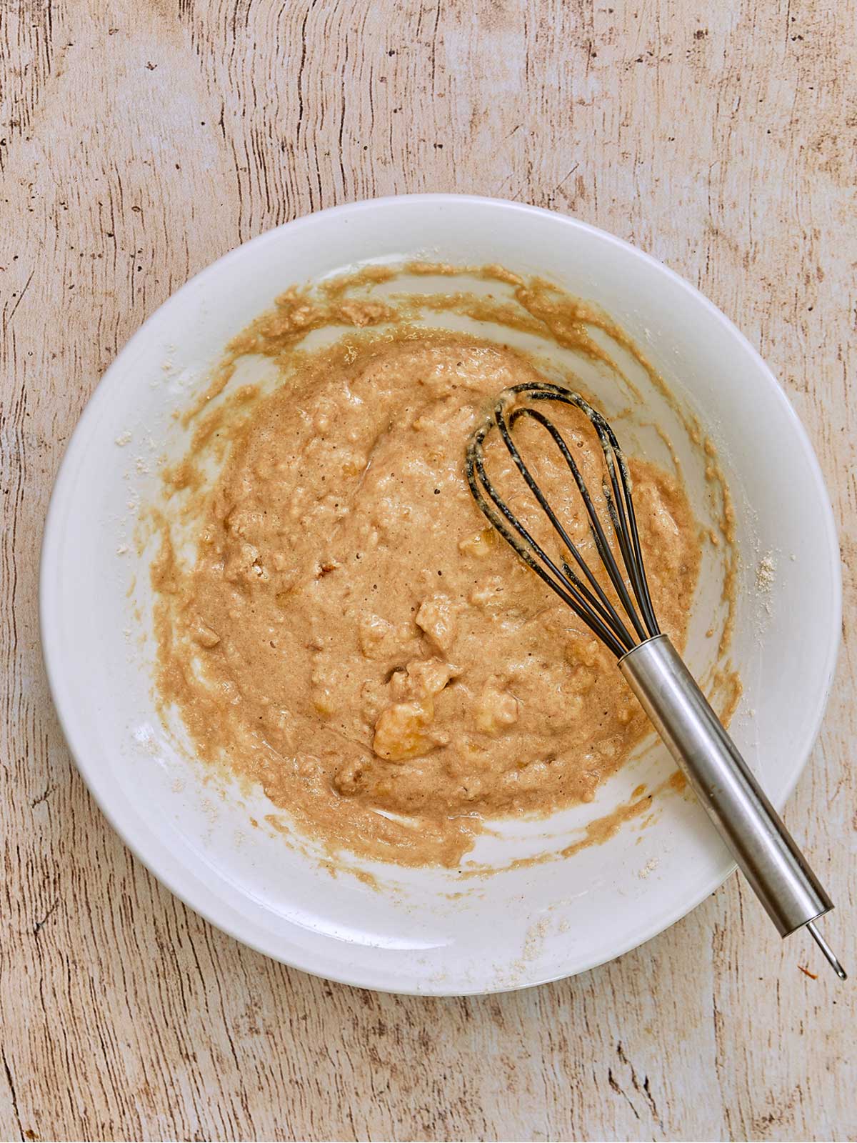 Batter is whisked for the last time.