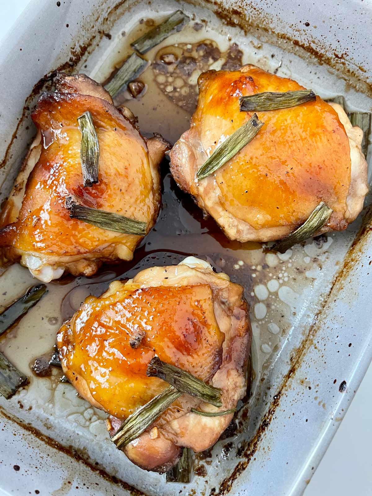 Golden brown chicken, fully cooked out of the oven.