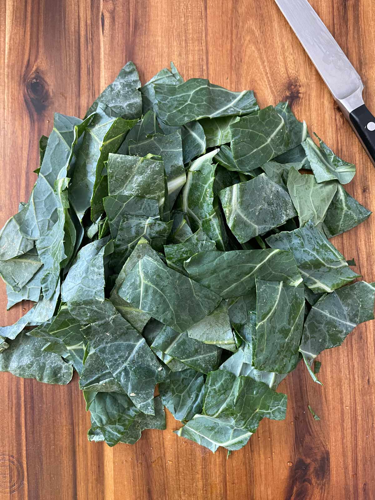 Collard greens chopped into bite-sized pieces.
