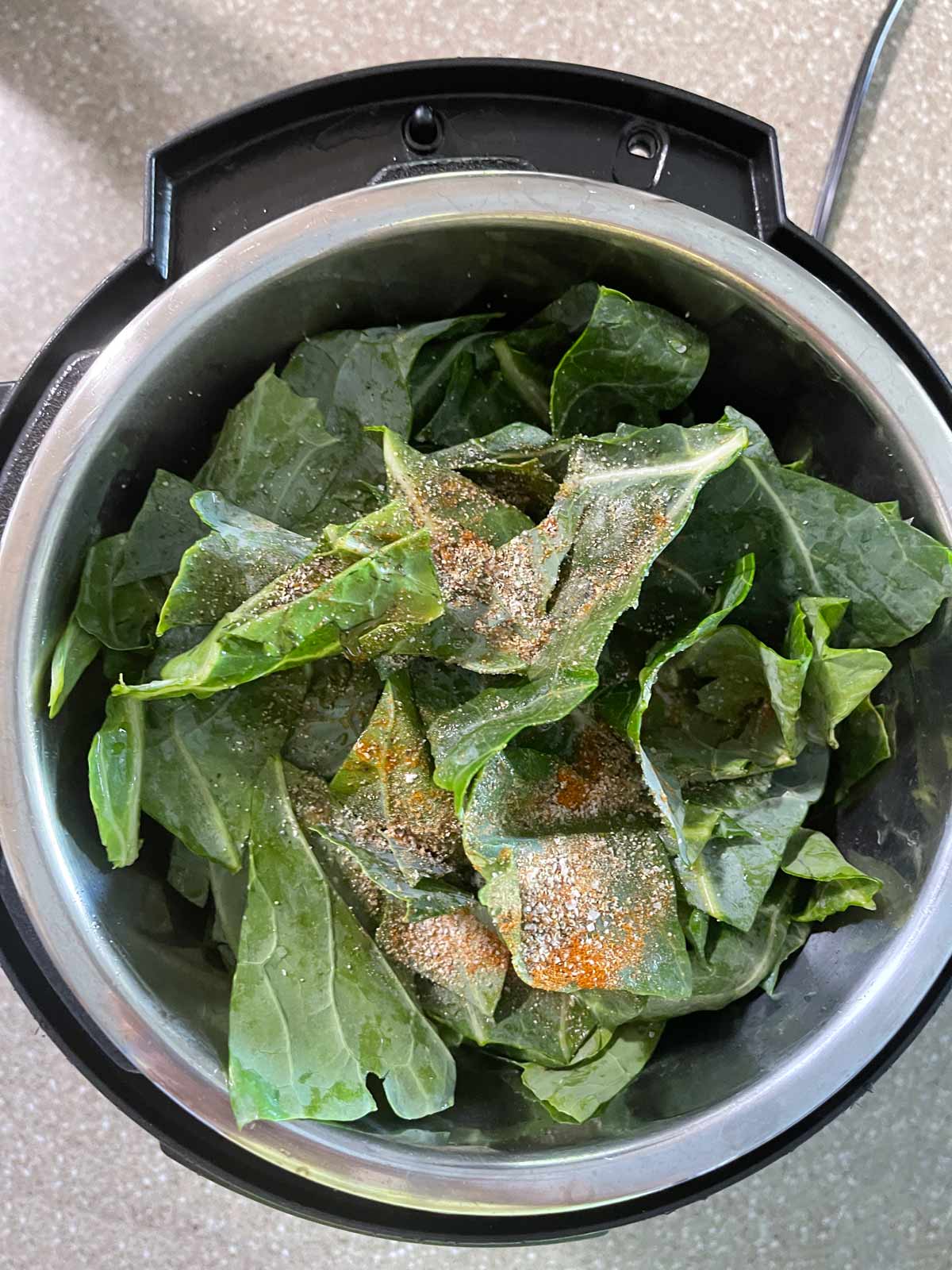Spices and (optional) brown sugar being placed into pot.