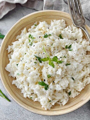 Bowl of creamy white Parmesan Rice.