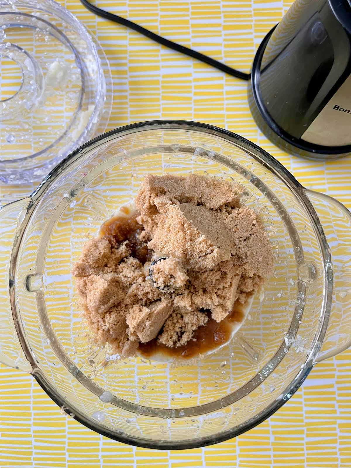 Picture of brown sugar being added to the food processor.