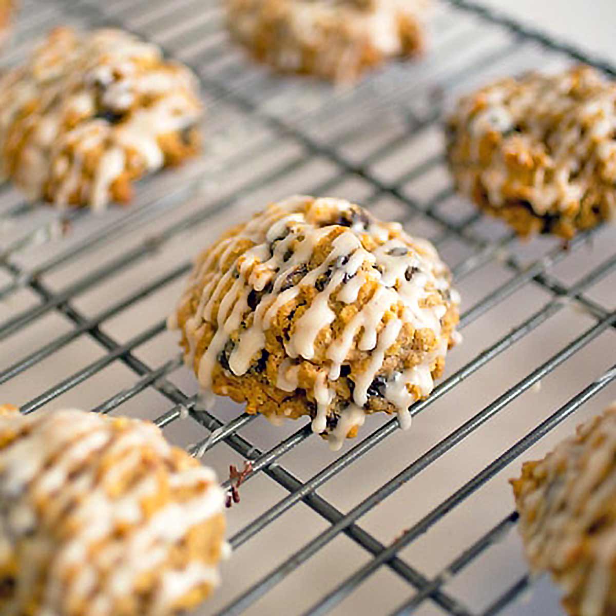 Wire rack with pumpkin oatmeal cookies.