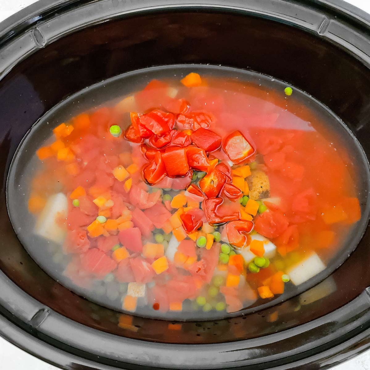 Water and bullion cubes were added to crockpot.