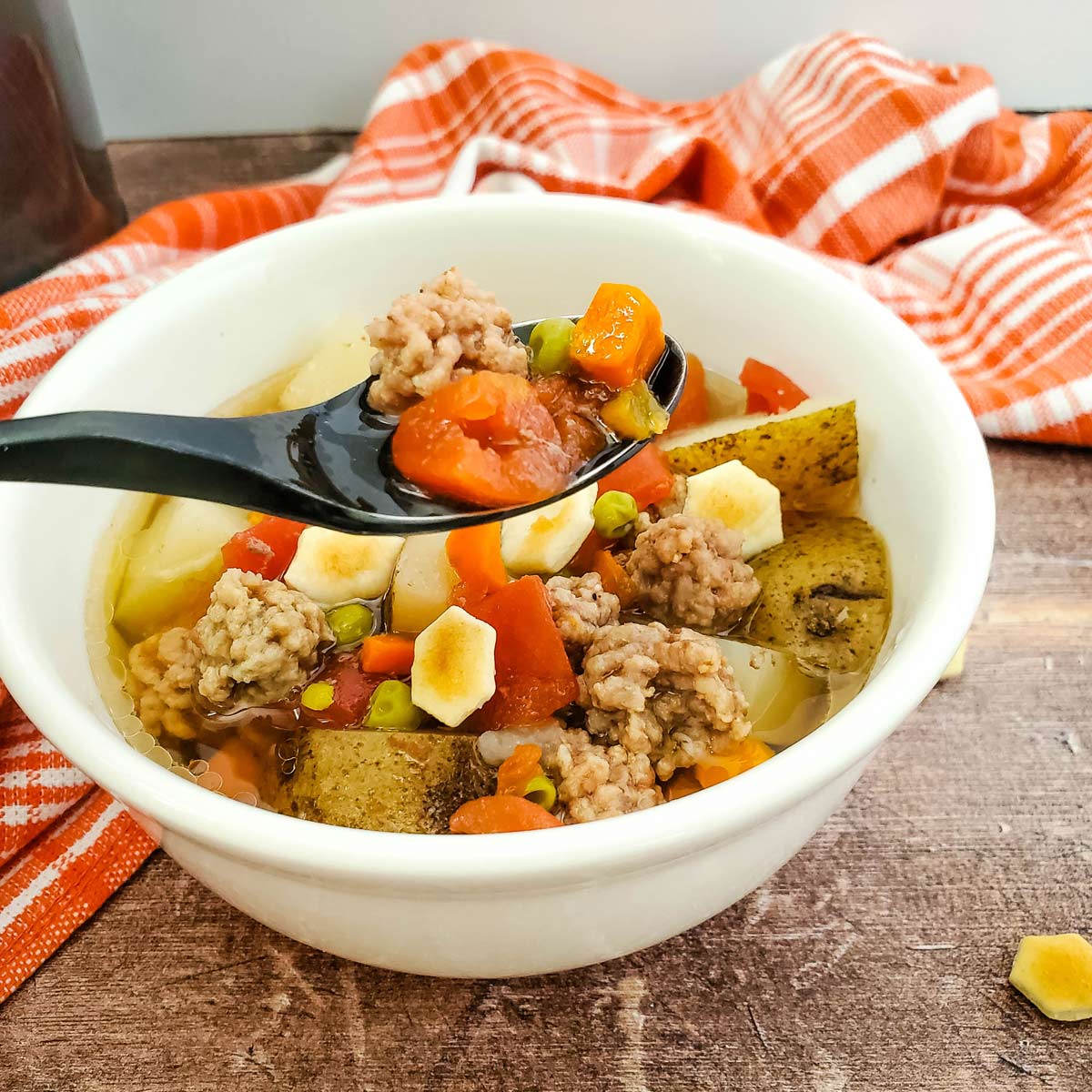 Bowl of soup with spoon.