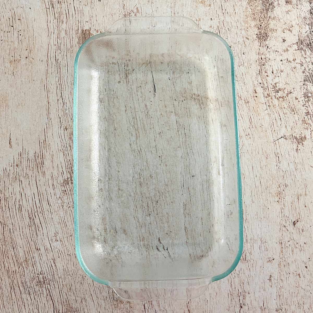 Glass baking dish sprayed with nonstick baking spray.