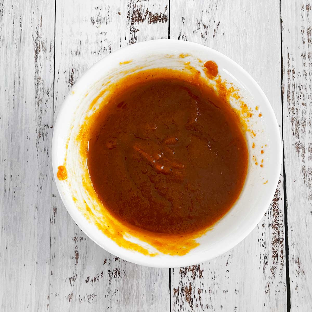 Bowl with mixed wet ingredients.