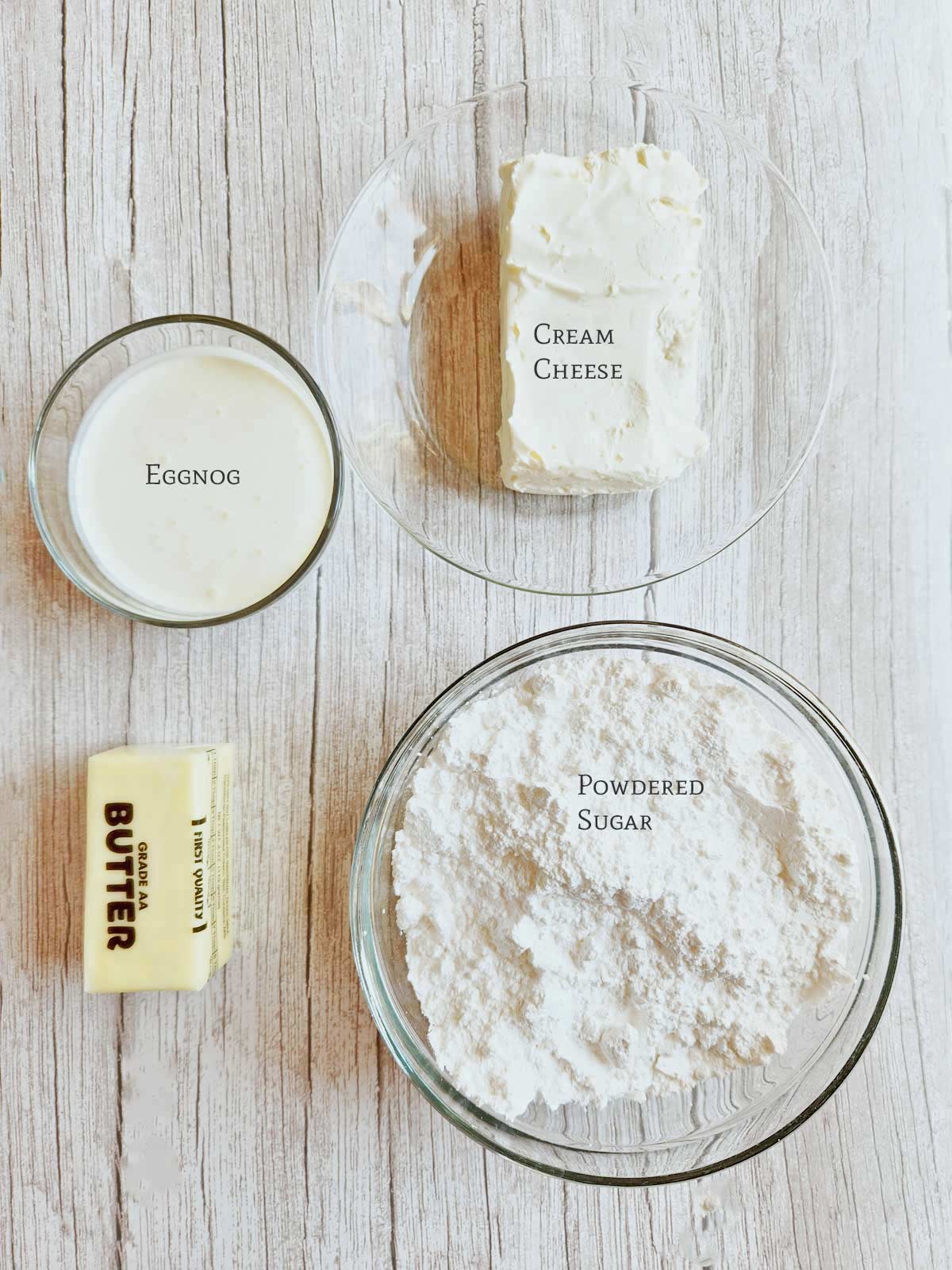 All of the frosting ingredients are on a white board.
