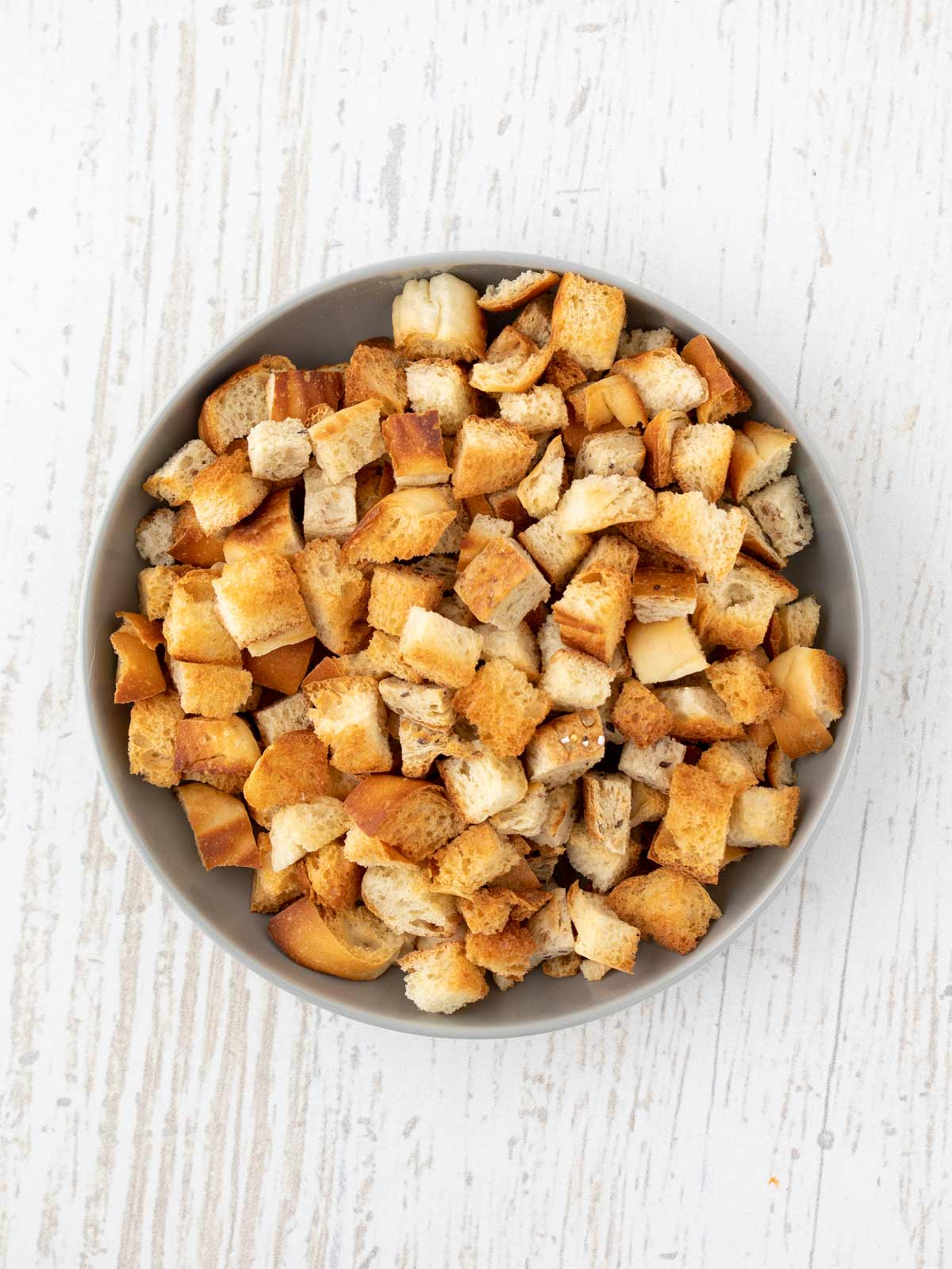 Bowl of stale bread cubes.
