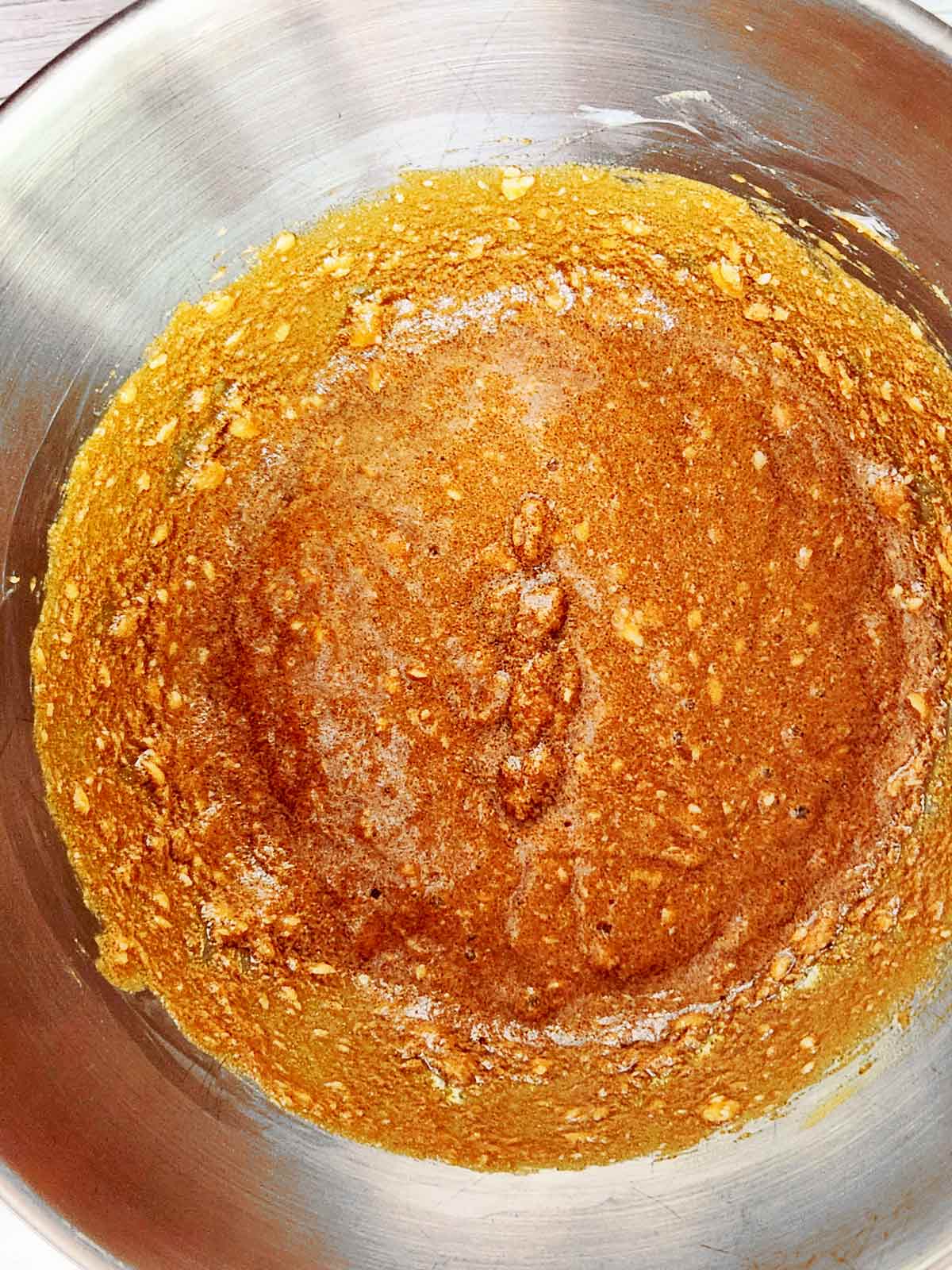 Wet ingredients in the mixing bowl.