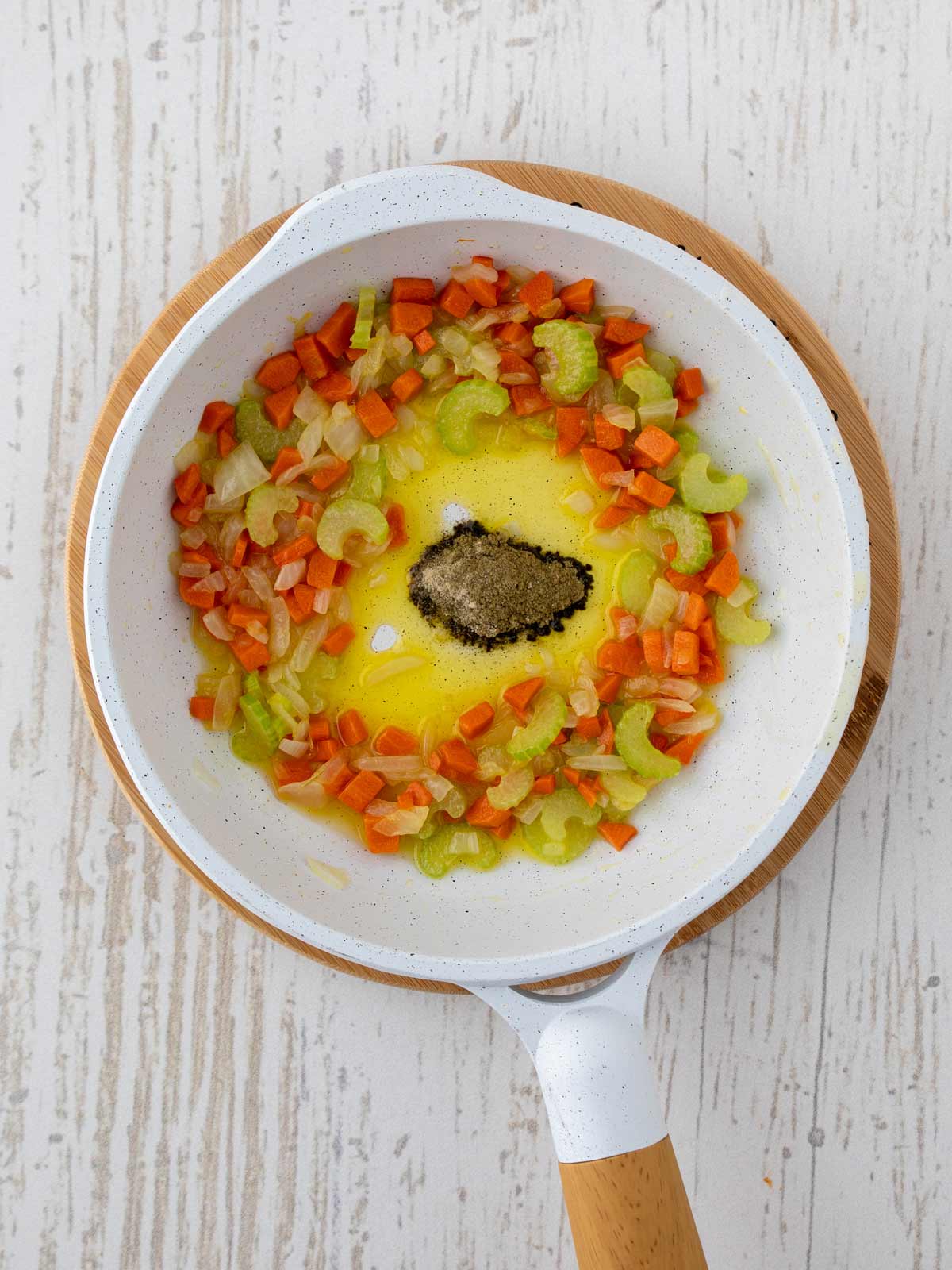 Cooked vegetables with seasonings added.