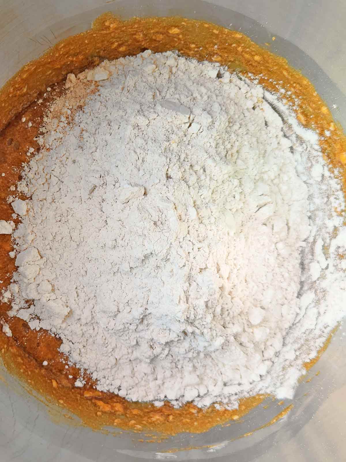 Wet and dry ingredients being mixed.