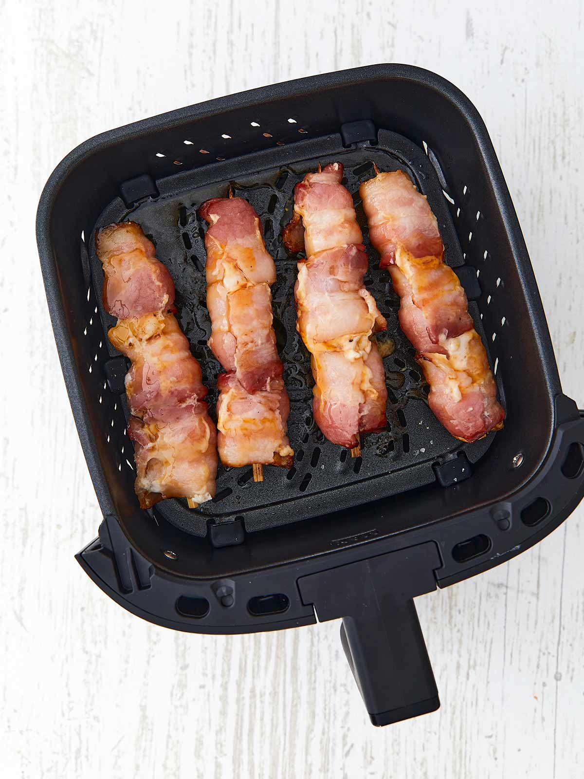 Chicken skewers on the flip side with hot honey brushed on.