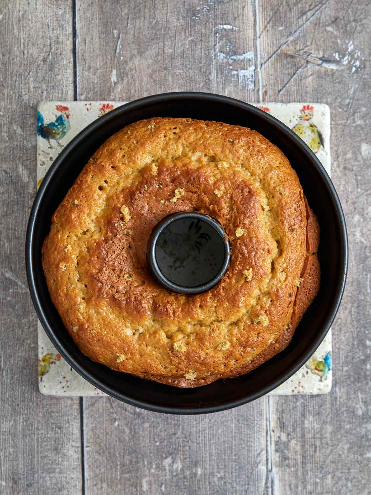 Baked cake with holes poke in it.