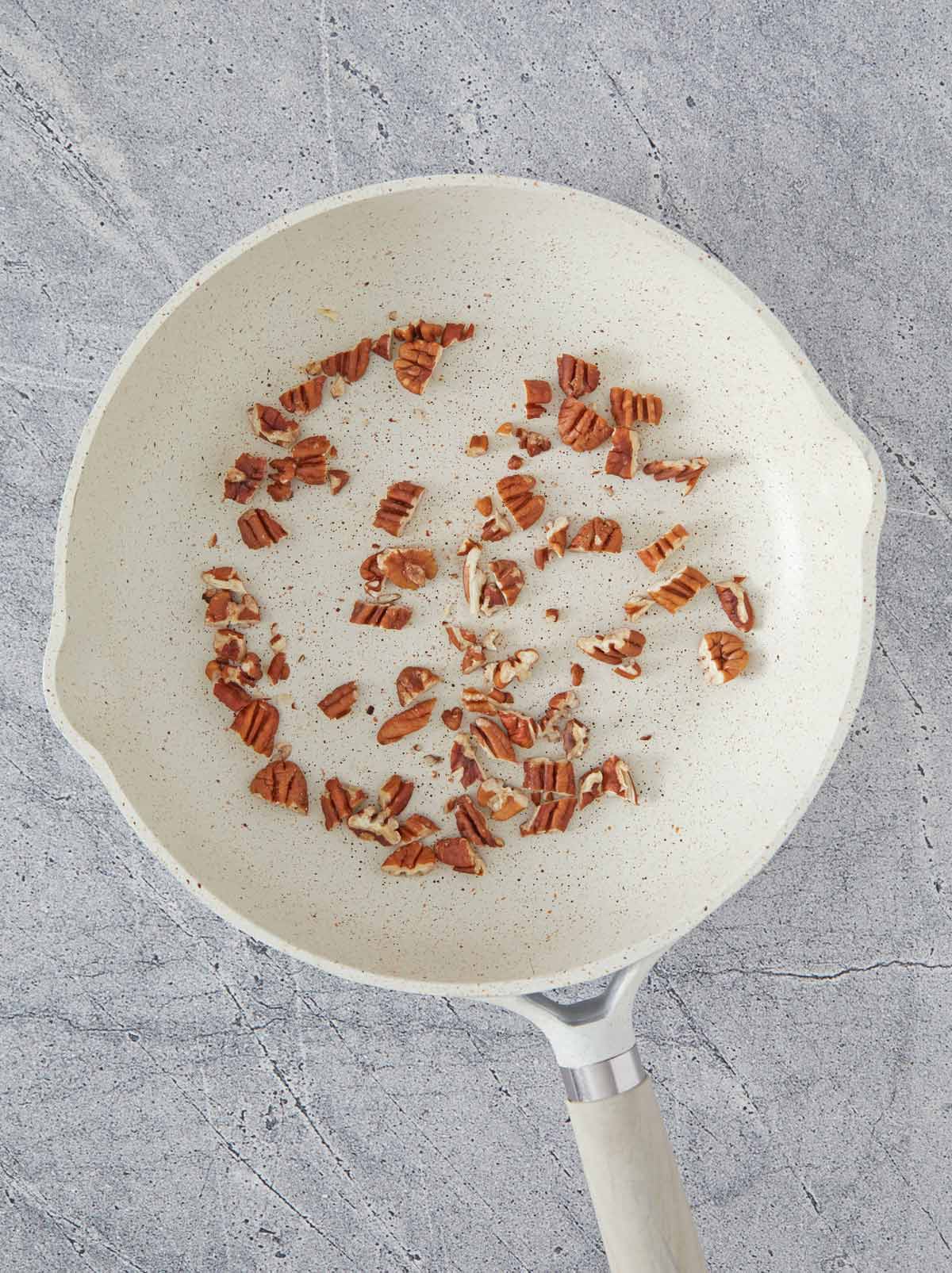Skillet with pecans.