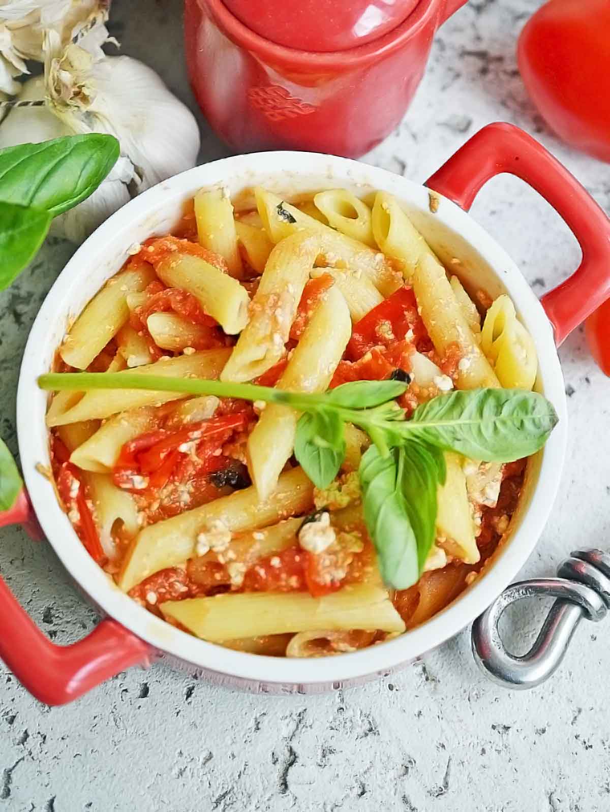 Finished pasta dish garnished with basil.