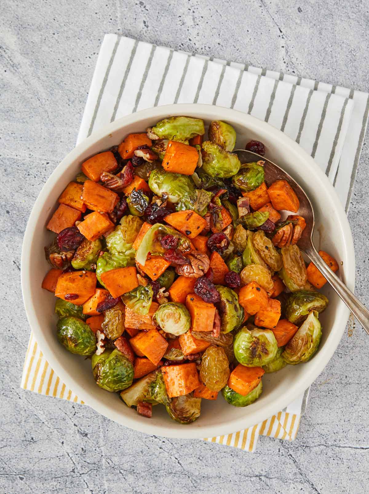 Serving bowl of Brussels Sprouts and Sweet Potatoes.